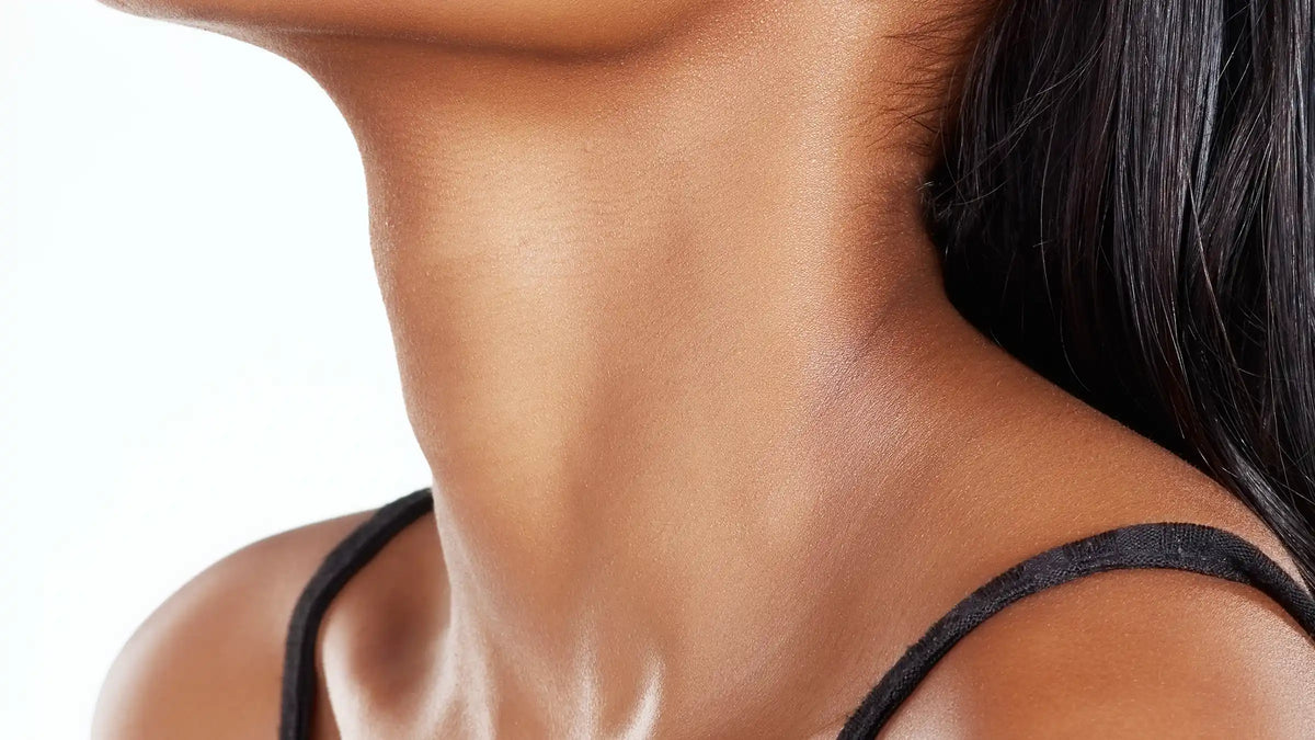 Close-up of uneven skin tone on the neck.